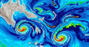 Tropical storm map showing the equator with prevailing wind patterns and storm tracks, in blue and green tones.
