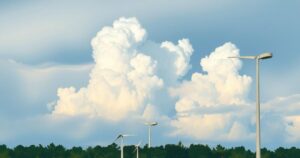 Partly cloudy skies over a serene landscape, depicting cooler temperatures and calm weather in Orlando.