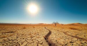 A vibrant landscape depicting the sweltering summer heat in Kazakhstan with a hot sun and barren ground.