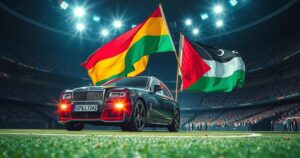 A performance scene featuring a car and flags of Sudan and Palestine in a stadium setting with bright colors.
