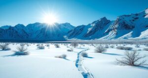 Snow-covered Atacama Desert and mountains under a blue sky during extreme cold wave in South America
