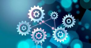 Abstract representation of global supply chains in medtech, with interconnecting gears against a blue and green color scheme.