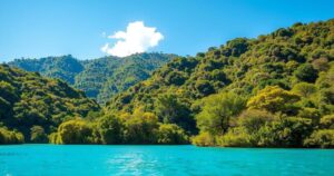 A serene landscape showcasing Angola's natural beauty, featuring lush greenery and tranquil waters, bright colors.